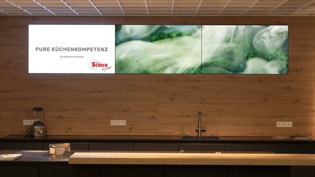 Kundenprojekte - neue Instore Medienkonzepte bei Wohn Schick mit Küchenscreens
