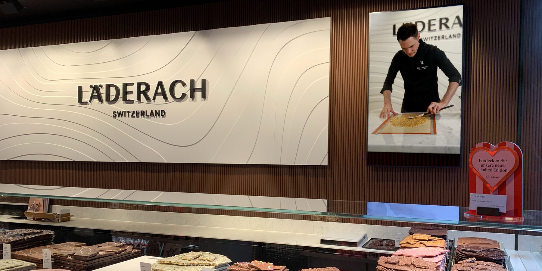 International digital signage solution for Läderach